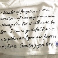 A Memorial Throw Blanket of forget-me-nots for someone who lost someone, a blanket of forget-me-nots